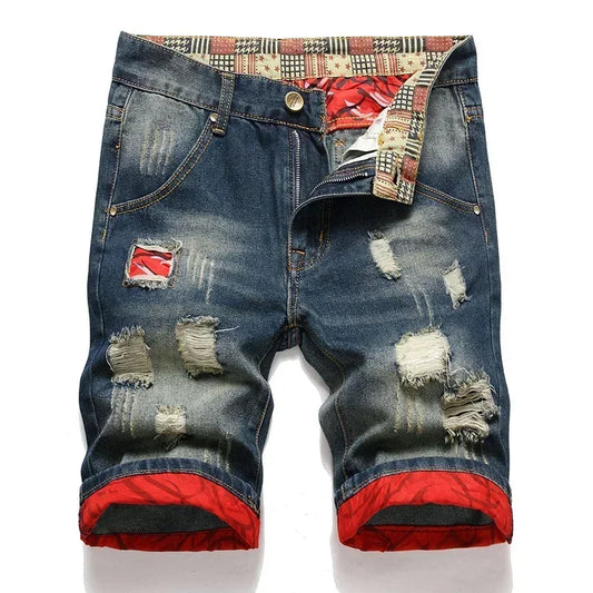 Pantalones cortos de mezclilla rasgados lavados
