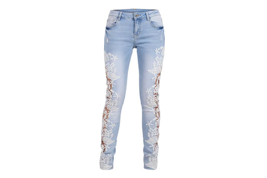 Vaqueros slim con detalles de encaje
